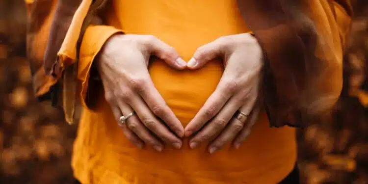 person touching stomach